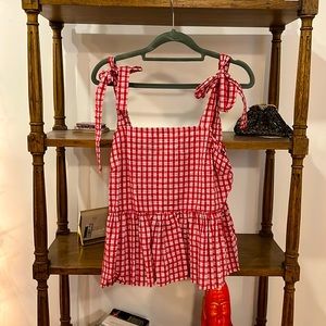 100% cotton gingham tank with a slight peplum effect. Purchased from madwell.